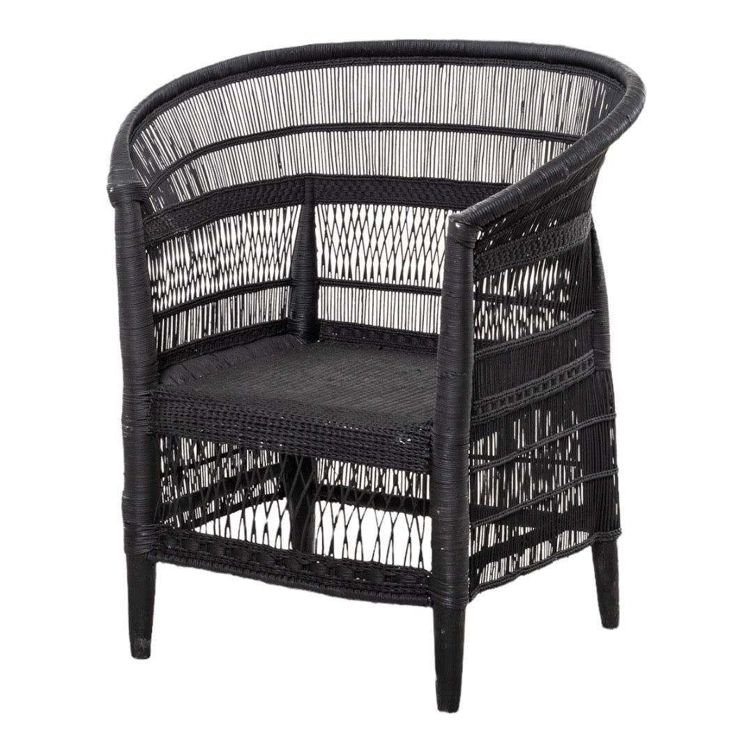 Black Malawi Cane Chair – artisanal design with curved backrest.