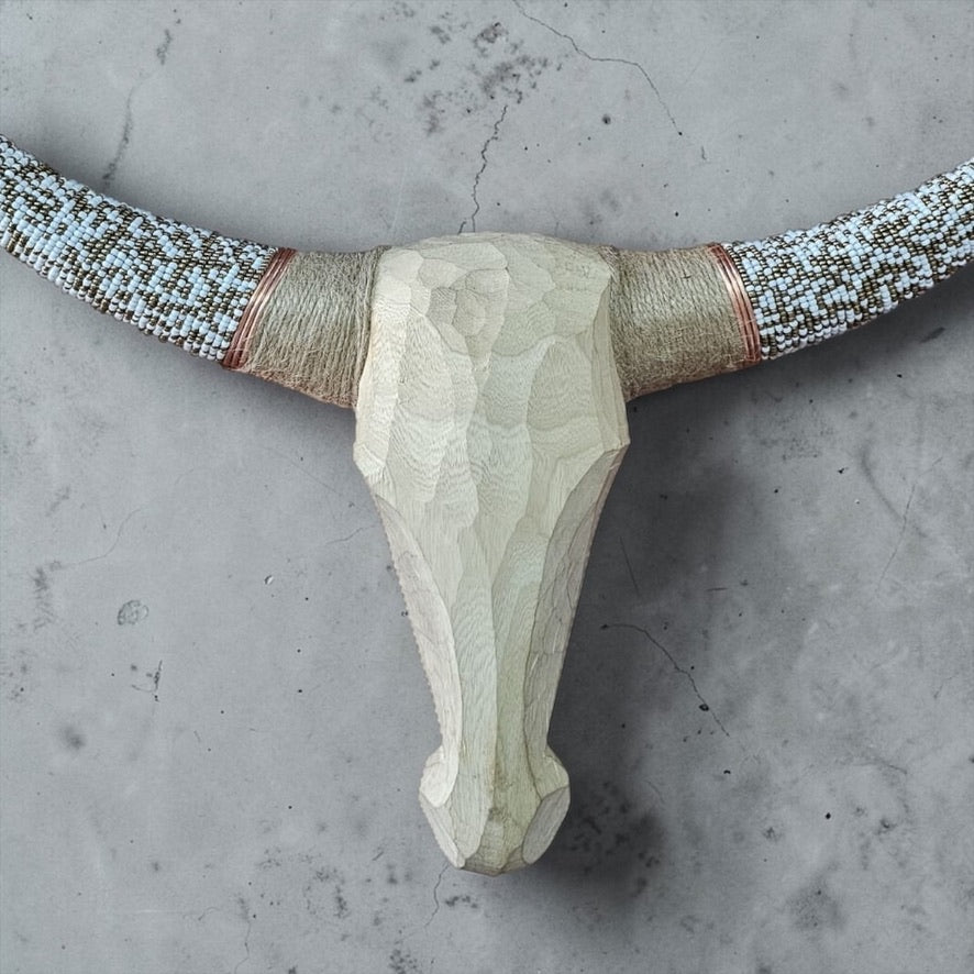 Hand-Carved Beaded Cow Skulls